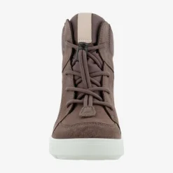 Urban snowboarder mid-cut